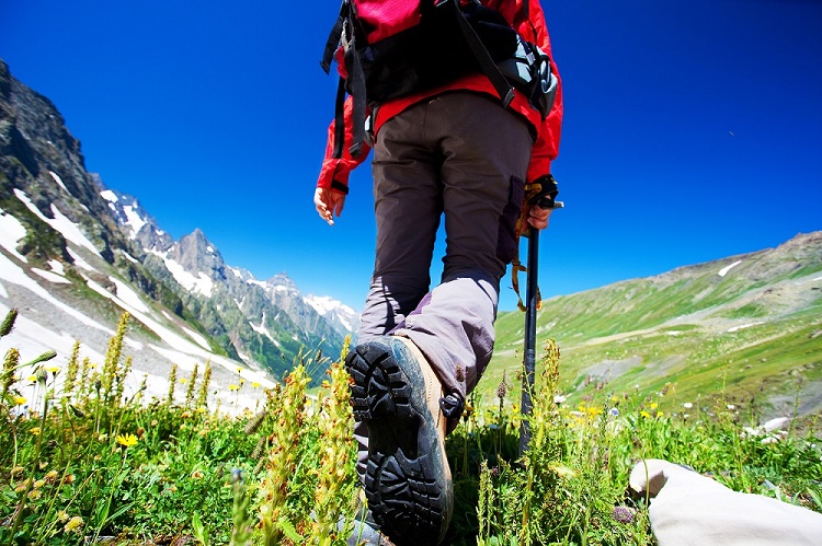 Hiker in Caucasus mountains
